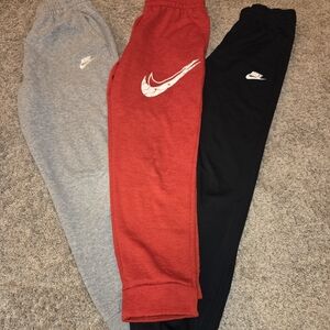 Nike Kids Sweatpants - Youth L Red, Gray, Black. Gently worn.